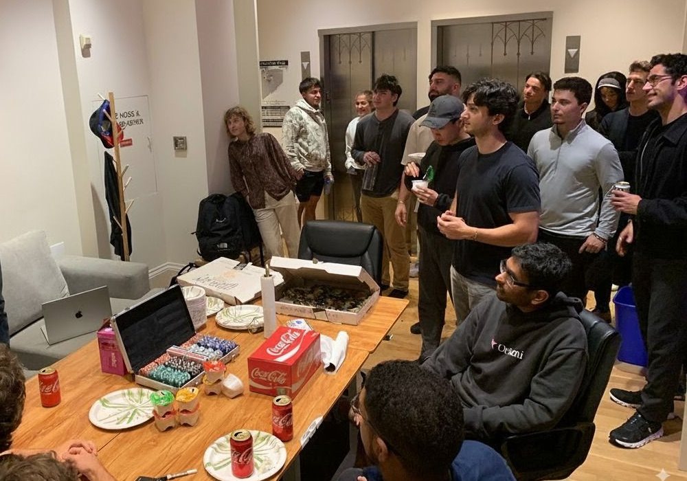 Attendees at a Monopoly Money Mondays meetup